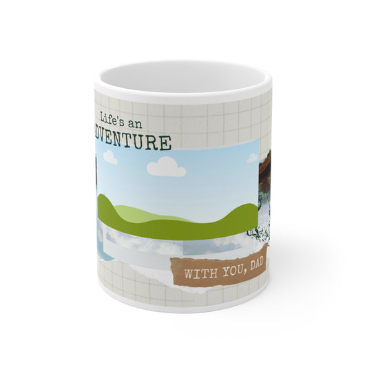 A white ceramic mug featuring a heartwarming father-themed design. The mug displays the phrase "Life's an Adventure" in playful font and includes a scenic illustration of green hills under a blue sky with white clouds. Below, there is a textured paper-like element with the words "WITH YOU, DAD" in bold, warm lettering. The design combines a grid background, nature-inspired imagery, and sentimental text to celebrate cherished moments with dad.