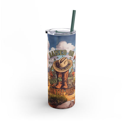 Rustic 20oz sublimation tumbler celebrating 'Raised on 90s Country Music' with charming cowboy boots, a hat, and a scenic countryside wagon design. Featuring vibrant landscapes and earthy tones, this double-walled tumbler keeps drinks hot or cold and includes a reusable straw, perfect for country music lovers and western lifestyle enthusiasts