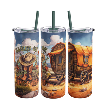 Rustic 20oz sublimation tumbler celebrating 'Raised on 90s Country Music' with charming cowboy boots, a hat, and a scenic countryside wagon design. Featuring vibrant landscapes and earthy tones, this double-walled tumbler keeps drinks hot or cold and includes a reusable straw, perfect for country music lovers and western lifestyle enthusiasts
