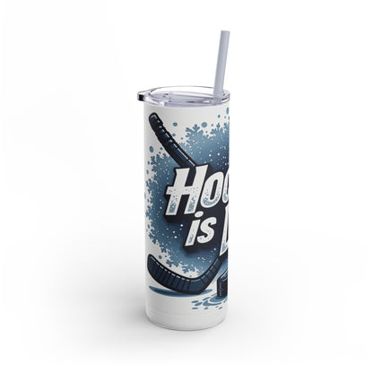 Dynamic 20oz sublimation tumbler showcasing the bold phrase 'Hockey is Life' with hockey sticks, puck, and ice splash details. Designed for hockey fans, this double-walled tumbler keeps beverages hot or cold and includes a reusable straw for sustainable hydration