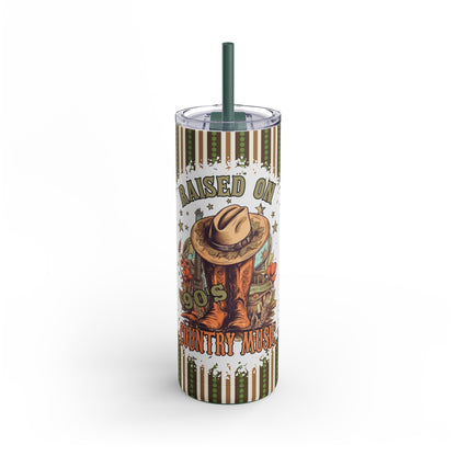 Retro-inspired 20oz sublimation tumbler featuring the nostalgic phrase 'Raised on 90s Country Music' with cowboy boots, a hat, and rustic accents. Designed with earthy tones and stripes, this double-walled tumbler keeps drinks hot or cold and includes a reusable straw, perfect for country music fans and vintage lovers.