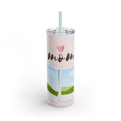 A set of three stainless steel tumblers with reusable straws and clear lids. The design features a soft pink background adorned with delicate floral accents in shades of pink and orange. The center tumbler displays the word "mom" in elegant script with a heart above it. Each tumbler includes placeholders for family photos, framed against a scenic backdrop of green hills, blue skies, and white clouds, creating a heartfelt and personalized theme perfect for moms.