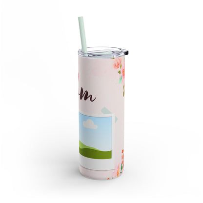 A set of three stainless steel tumblers with reusable straws and clear lids. The design features a soft pink background adorned with delicate floral accents in shades of pink and orange. The center tumbler displays the word "mom" in elegant script with a heart above it. Each tumbler includes placeholders for family photos, framed against a scenic backdrop of green hills, blue skies, and white clouds, creating a heartfelt and personalized theme perfect for moms.