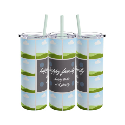 A set of three tall stainless steel tumblers with reusable straws and clear lids. The design features placeholders for family photos, set against a scenic backdrop of rolling green hills, blue skies, and fluffy white clouds. The center tumbler prominently displays the words "Happy Family" with the phrase "happy to be with family" written in elegant white script on a gray background with subtle decorative dots. This set combines a calming, family-centric theme with a modern and clean aesthetic.