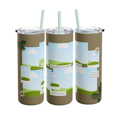 A set of three stainless steel tumblers with reusable straws and clear lids. The design features a warm brown background with placeholders for scenic photo frames showing green hills and blue skies. The central tumbler displays the phrase "Memories of Friends" and "Best Friend" in elegant, simple text. Additional details include green leaves, a daisy flower, and the heartfelt phrase "I love you so much, my friend!" on one tumbler. The design evokes a sense of friendship, nostalgia, and personalization.
