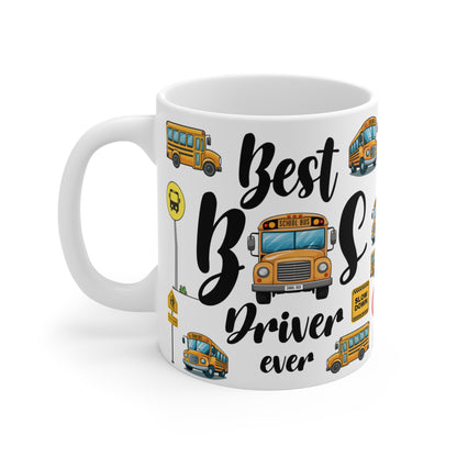 A white ceramic mug featuring a colorful school bus safety theme. The design includes bright yellow school buses, red stop signs, "Slow Down" signs, a 10-speed limit sign, and pedestrian crossing symbols. The playful pattern combines road safety elements with cartoon-style illustrations of school buses, creating a vibrant and educational design.
